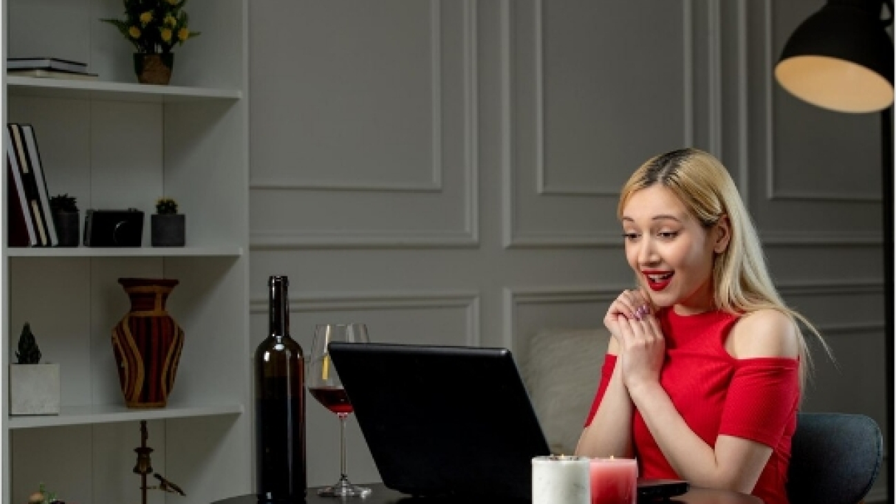 virtual-love-cute-blonde-girl-red-dress-distance-date-with-wine-smiling_140725-164175